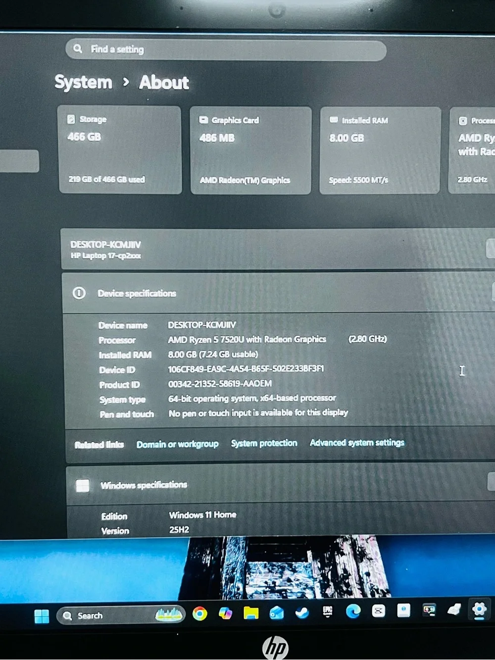 HP Silver Laptop with Blue Display and Dark Gray Keycaps
